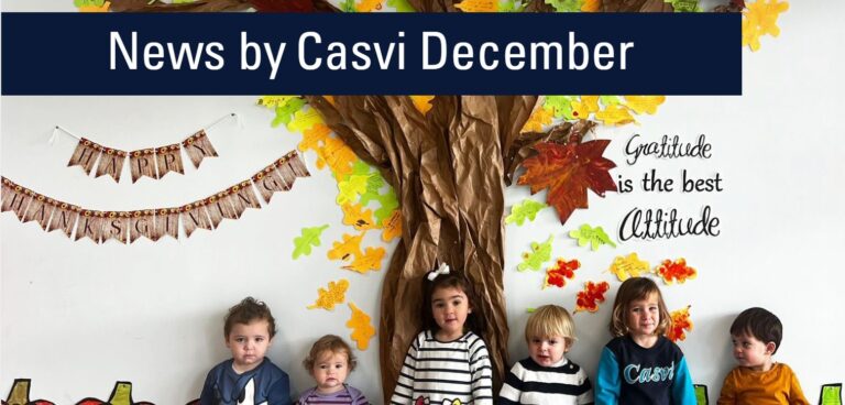 Niños de Nursery de Casvi Tres Cantos posando en una decoración de Acción de Gracias